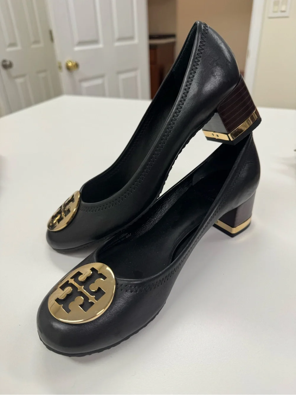 Tory Burch Black Leather Block Heel Pumps with Gold Logo